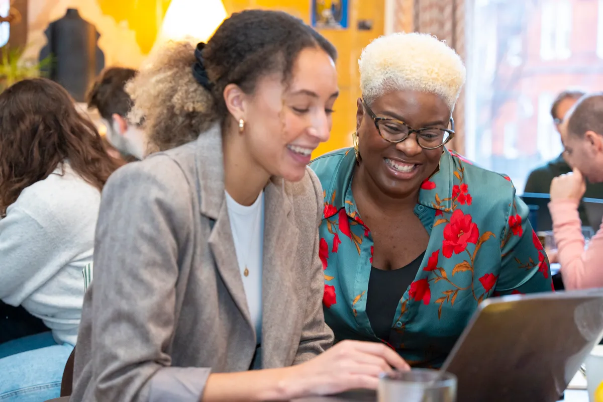 Colleagues working on AI exercises